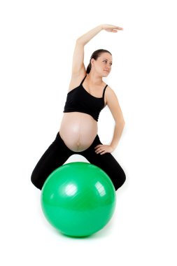 hamile kadın excercises jimnastik topu ile. güzel pregnan