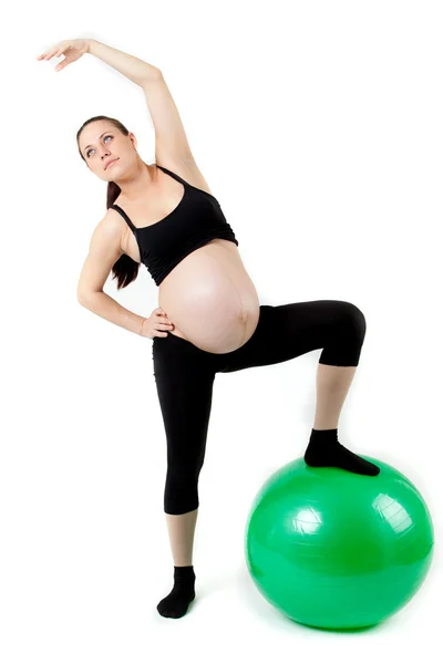 Pregnant woman excercises with gymnastic ball. Beautiful pregnan — Stock Photo, Image