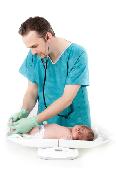 Läkare med en baby — Stockfoto