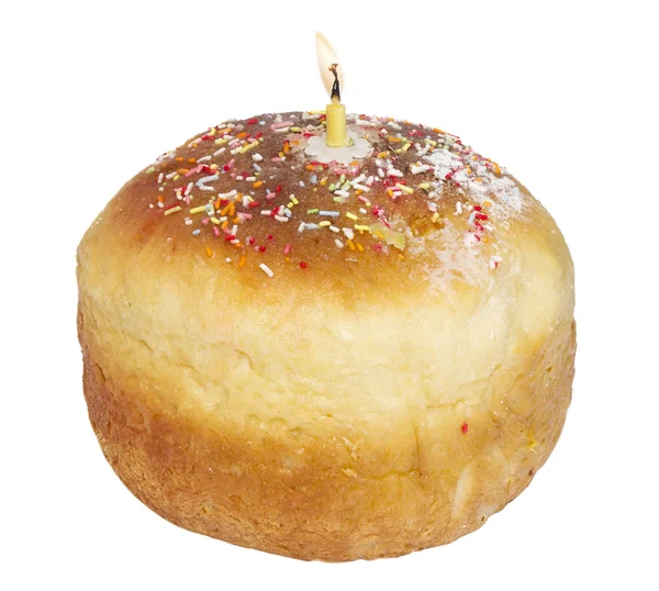 Пасхальный торт со свечой — стоковое фото