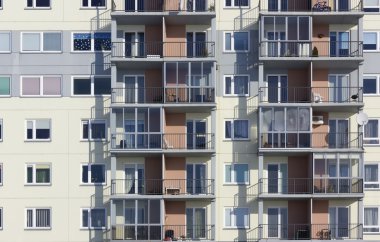 Windows of a multiroom apartment house clipart