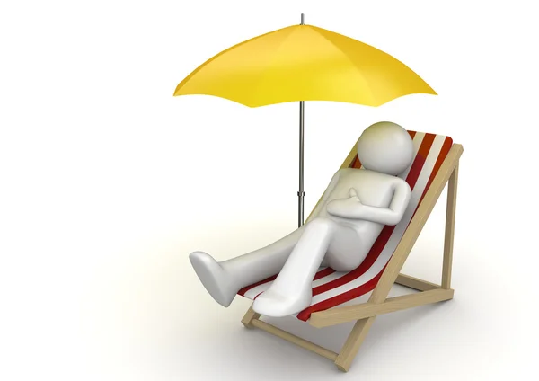 Man lying on a beach chair ynder umbrella — Stock Photo, Image