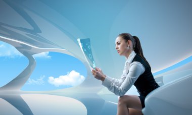 Sexy businesswoman examining future digital report - newspaper (outstanding business in interiors - interfaces series) clipart