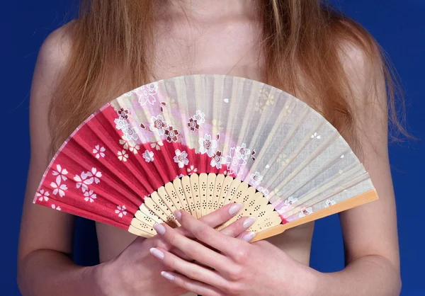 stock image Girl hanging on to japanese fan