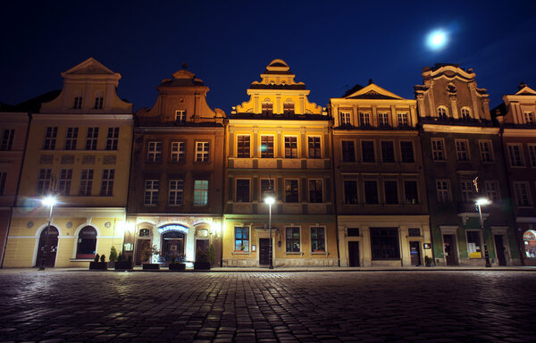 Old Market and moon in Poznan, Poland
