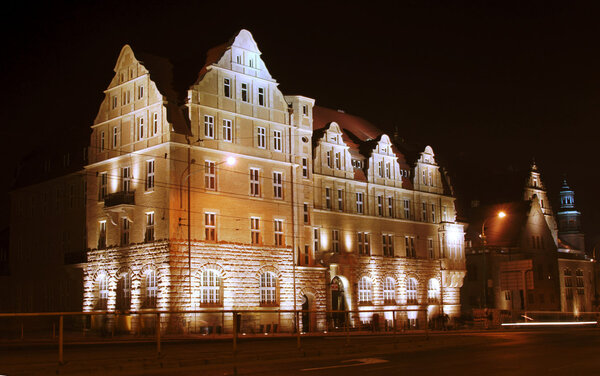 Buildings university in Poznan by night