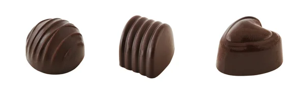 Tři čokoládové bonbony — Stock fotografie