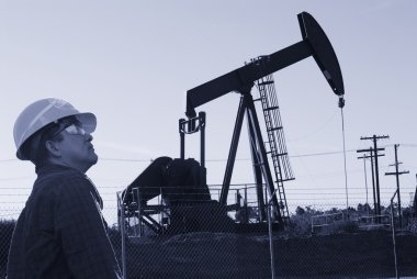 Oil worker with yellow hardhat clipart