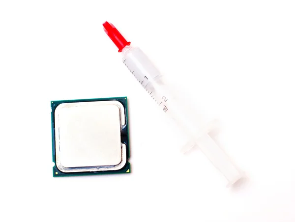 Beyaz üzerinde CPU ve termal yapıştırıcı — Stok fotoğraf