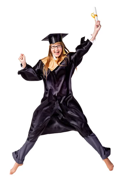Happy female graduate jumping — Stock Photo, Image