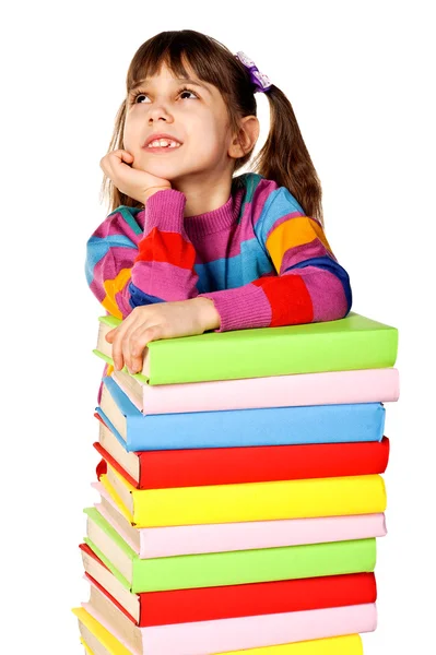 Menina segurando pilha de livros . — Fotografia de Stock