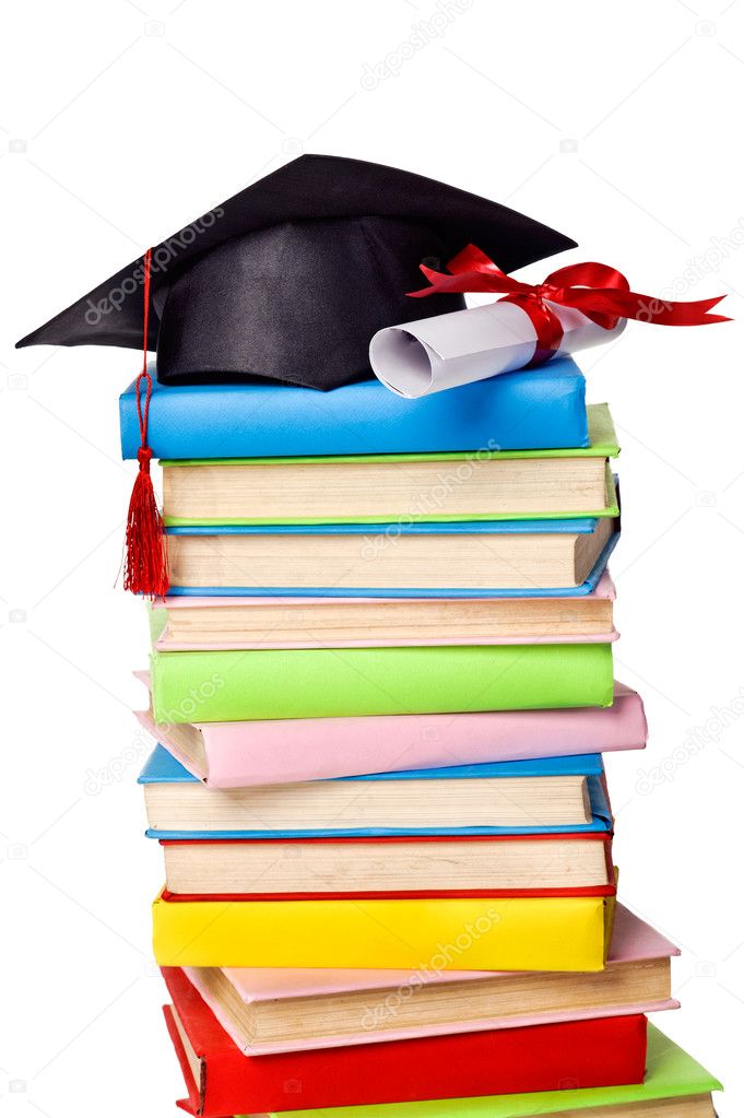 Cap and diploma on top of stack of books