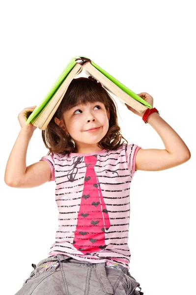 Cote niña con un libro mirando hacia arriba —  Fotos de Stock