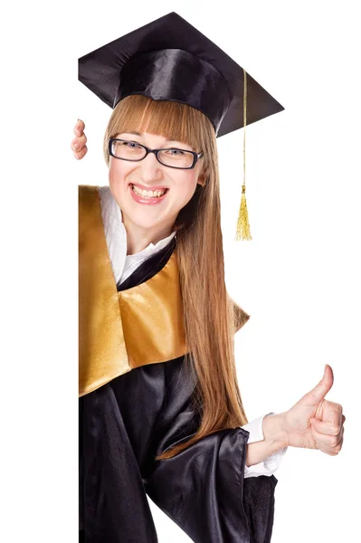 Estudiante de graduación sonriente sosteniendo un signo en blanco —  Fotos de Stock