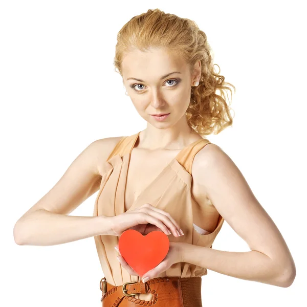 Happy young woman with heart in her hands — Stock Photo, Image