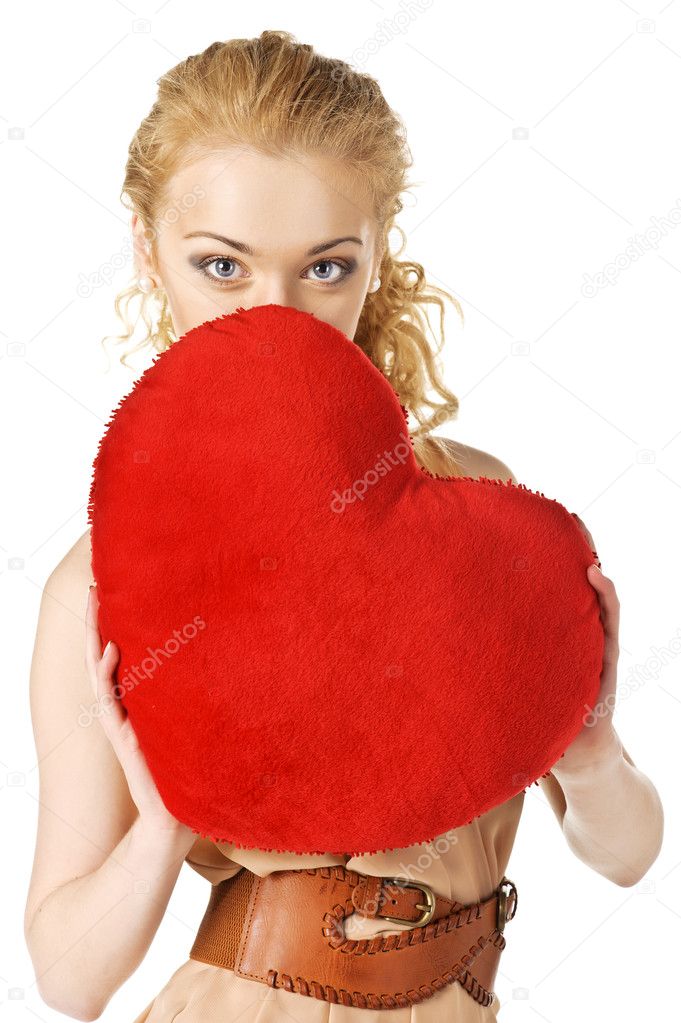 Happy young woman holding heart. Valentines day