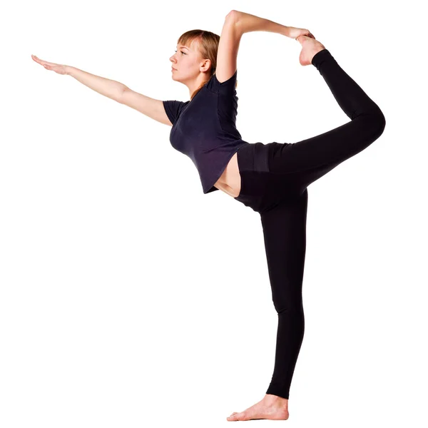 Schöne junge Frau macht Yoga-Übungen — Stockfoto