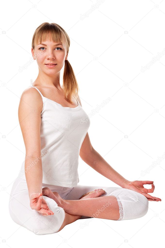 Young woman in the lotus pose