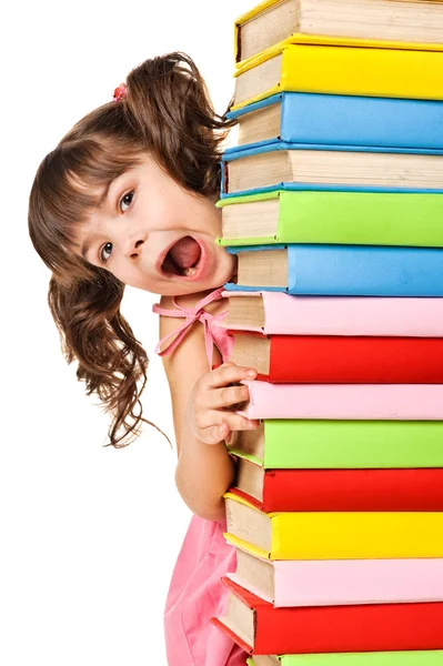 Happy little schoolgirl with a stack of books — Stock Photo, Image