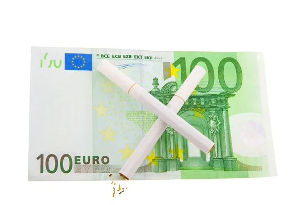 Two cigarettes crossed over one hundred euro bill — Stock Photo, Image