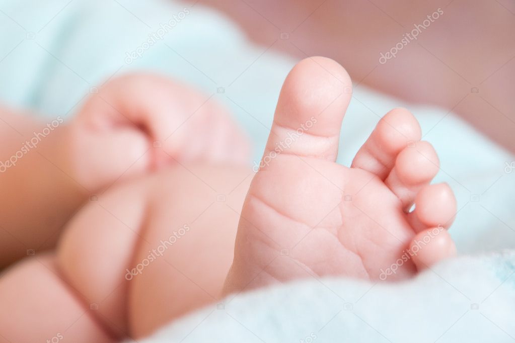 Baby's foot on blanket