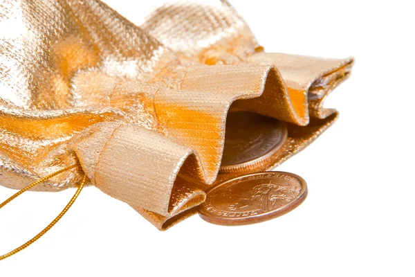Sacola dourada com moedas de um dólar dentro sobre branco — Fotografia de Stock