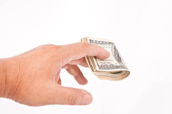 La mano del hombre dando dólares — Foto de Stock