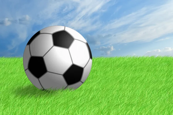 Pelota de fútbol sobre hierba verde. — Foto de Stock