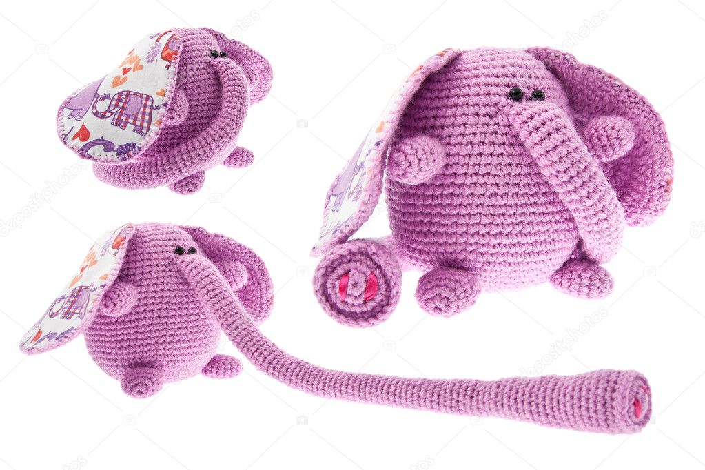 Three pink elephants with long trunk.