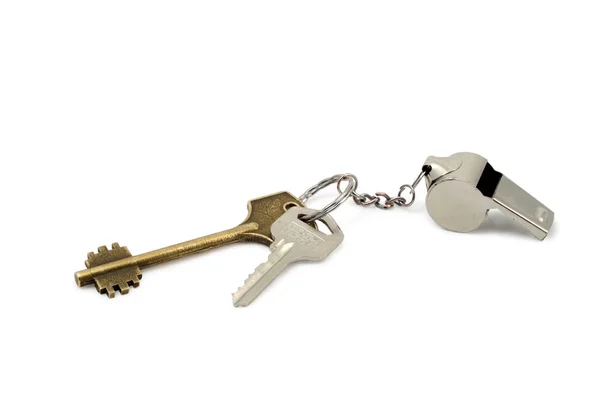 Ключи и свисток — стоковое фото
