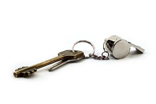 Ключи и свисток — стоковое фото