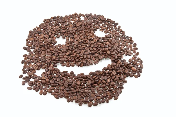 Grãos de café dispostos em smiley . — Fotografia de Stock