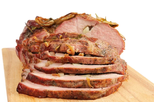 Geroosterd varkensvlees op een houten bord — Stockfoto