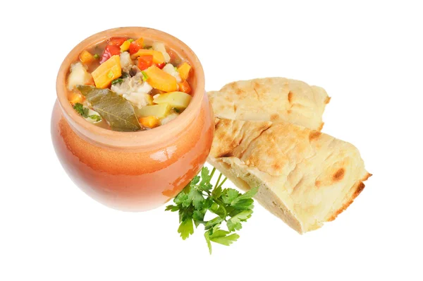 Roast in a pot and pita bread — Stock Image Roast in a pot and pita bread Stock Picture