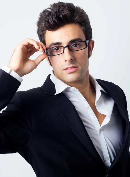 Expresivní podnikatel v černém obleku a brýle — Stock fotografie