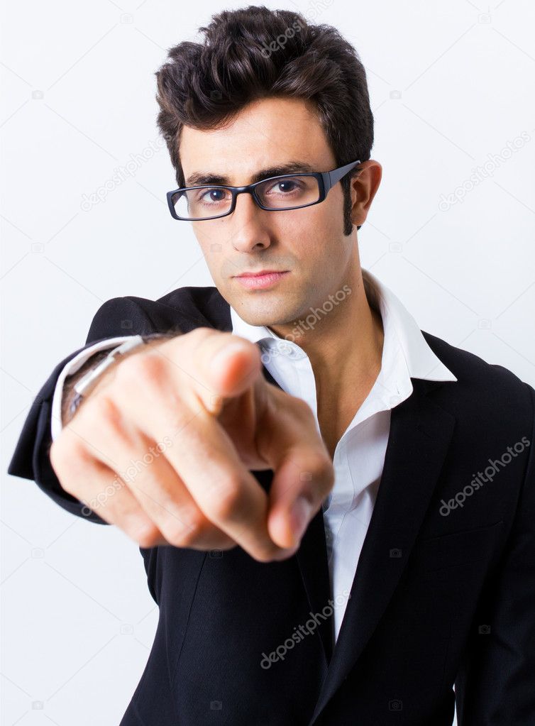 Expressive businessman in black suit and glasses