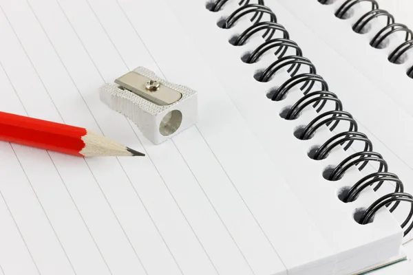 Pencil and Sharpener on Pad — Stock Photo, Image