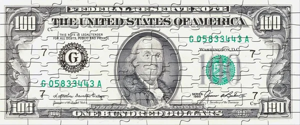 Пазл-доллар — стоковое фото