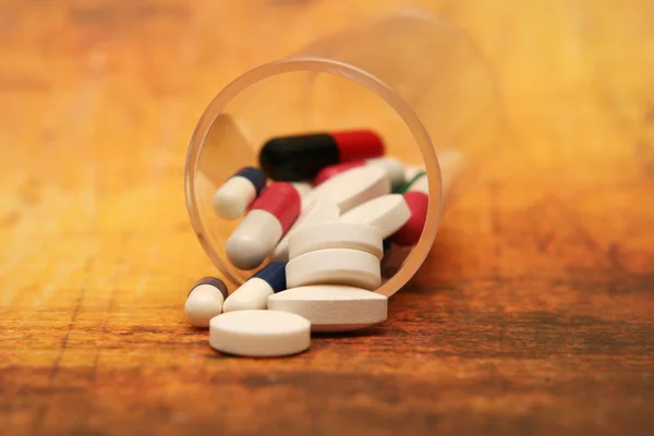 Tabletták, grunge, háttér — Stock Fotó