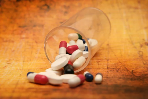 Pills on grunge background — Stock Photo, Image