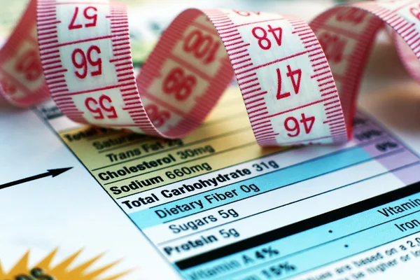 Datos nutricionales y cinta métrica — Foto de Stock