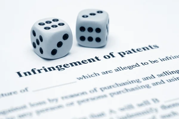 Infrigement of patents — Stockfoto