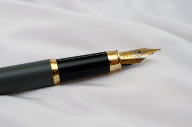 Fountain pen on satin clipart