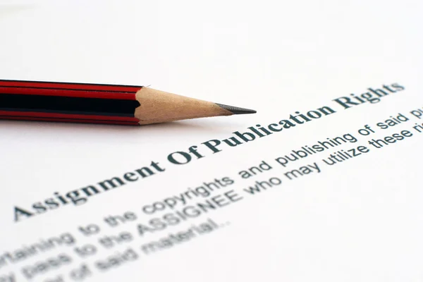 Назначение прав на публикацию — стоковое фото