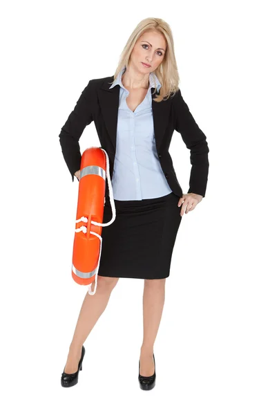 Beautiful businesswoman with life buoy — Stock Photo, Image
