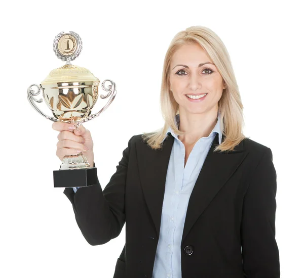 Empresaria ganando un trofeo —  Fotos de Stock