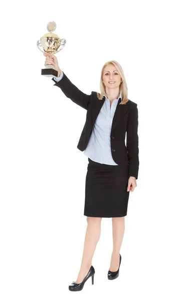 Businesswoman winning a trophy — Stock Photo, Image