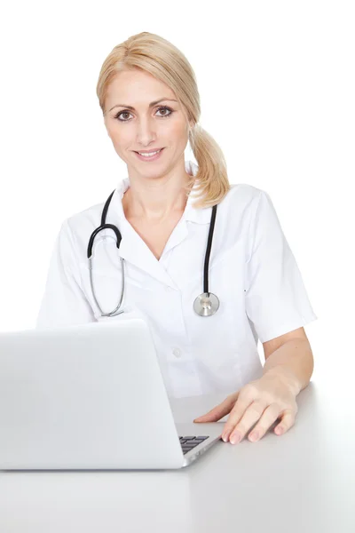 Medical doctor working on laptop — Stock Photo, Image