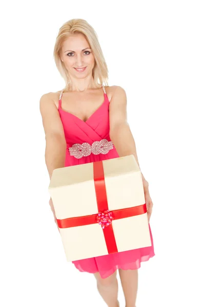 Beautiful young woman holding a gift box — Stock Photo, Image