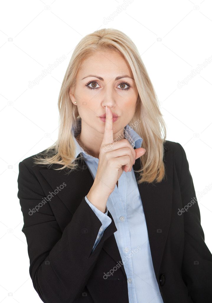 Beautilful business woman making a silence gesture